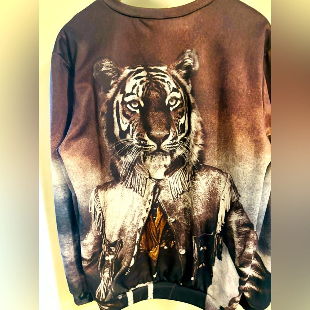 Mr Gugu long sleeve top. Design same on front and back. Worn once.